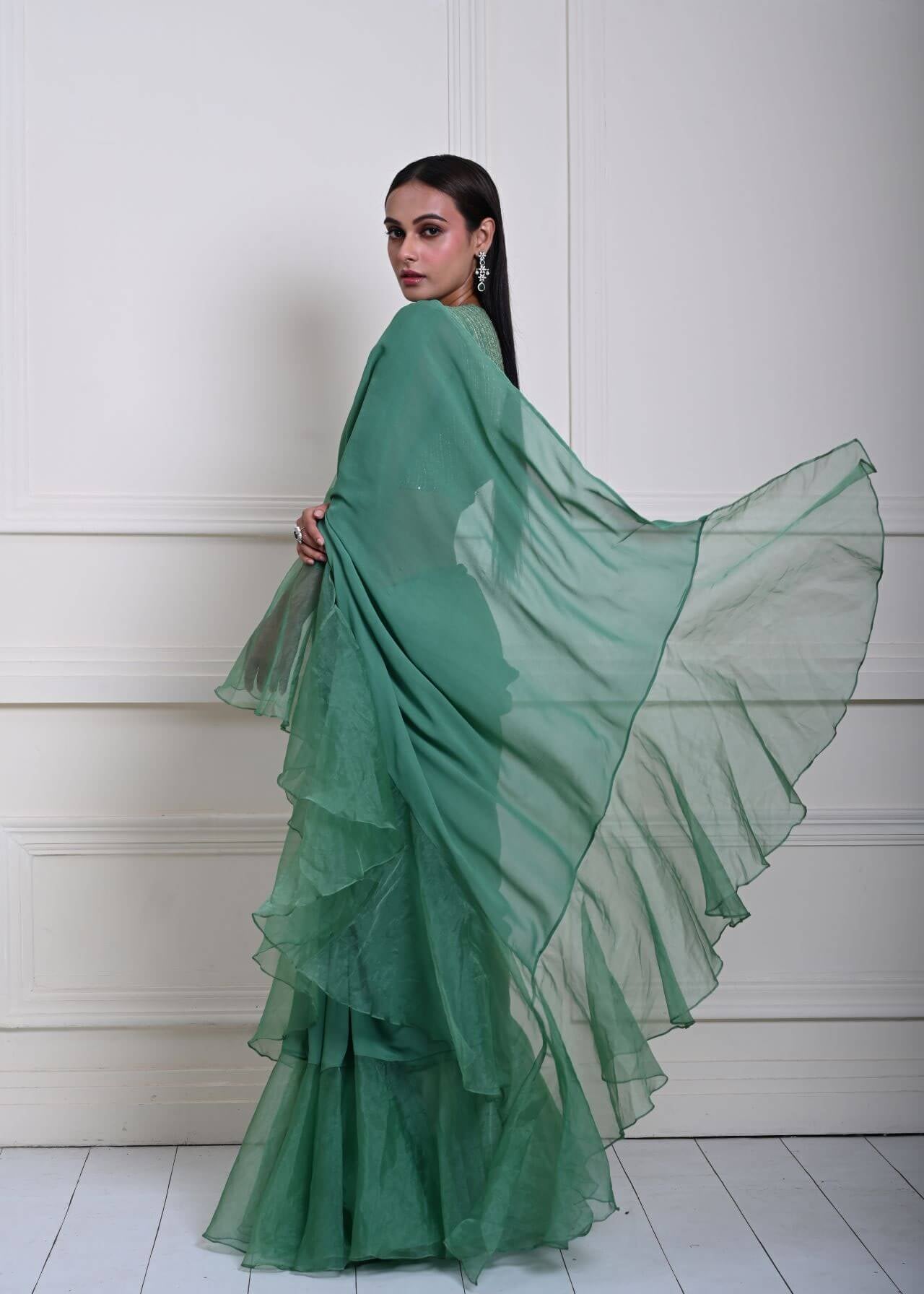 Exquisite Sea Green Georgette Ruffle Saree with Modern look