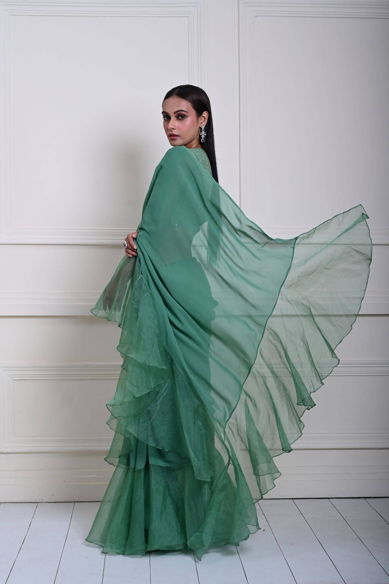 Exquisite Sea Green Georgette Ruffle Saree with Modern look