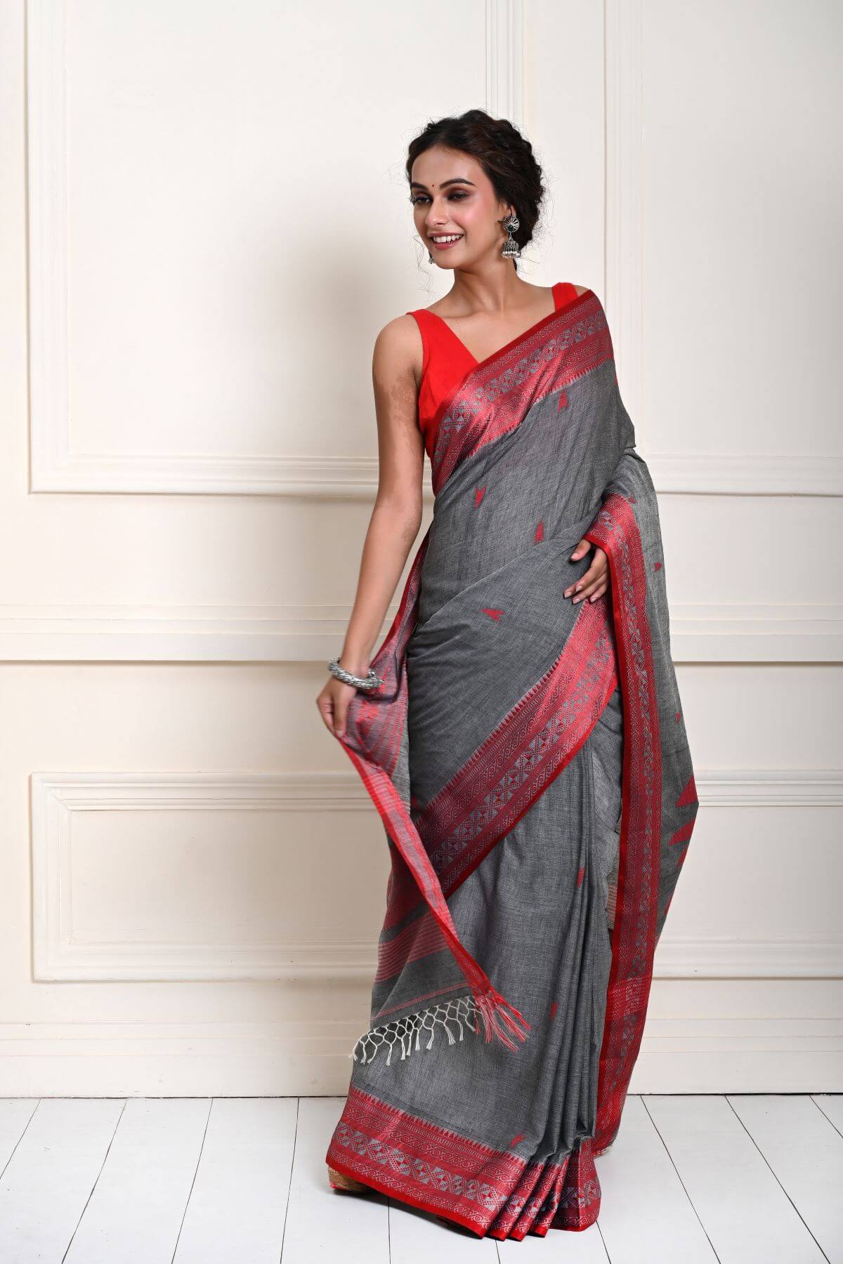 Grey Handloom Saree with Red Border and all-over Buta 
