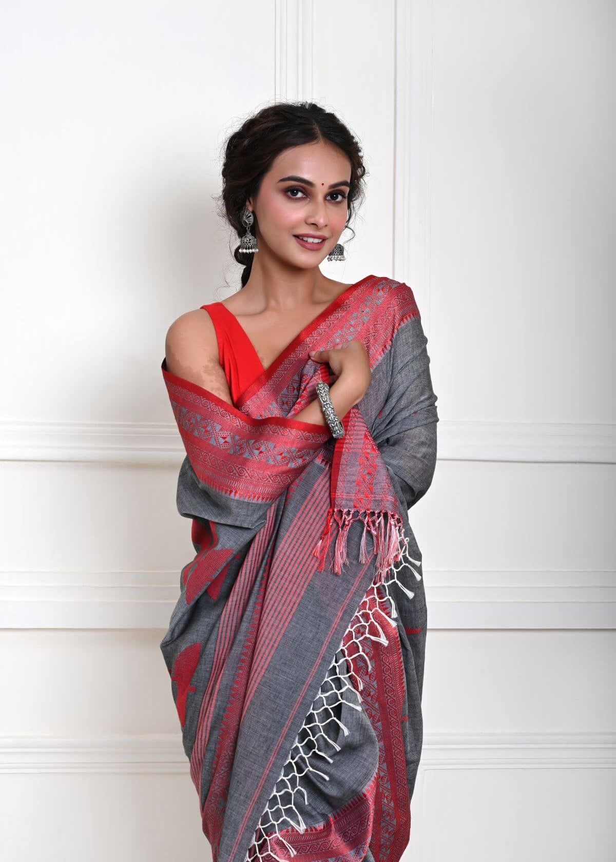 Grey Handloom Saree with Red Border and all-over Buta 
