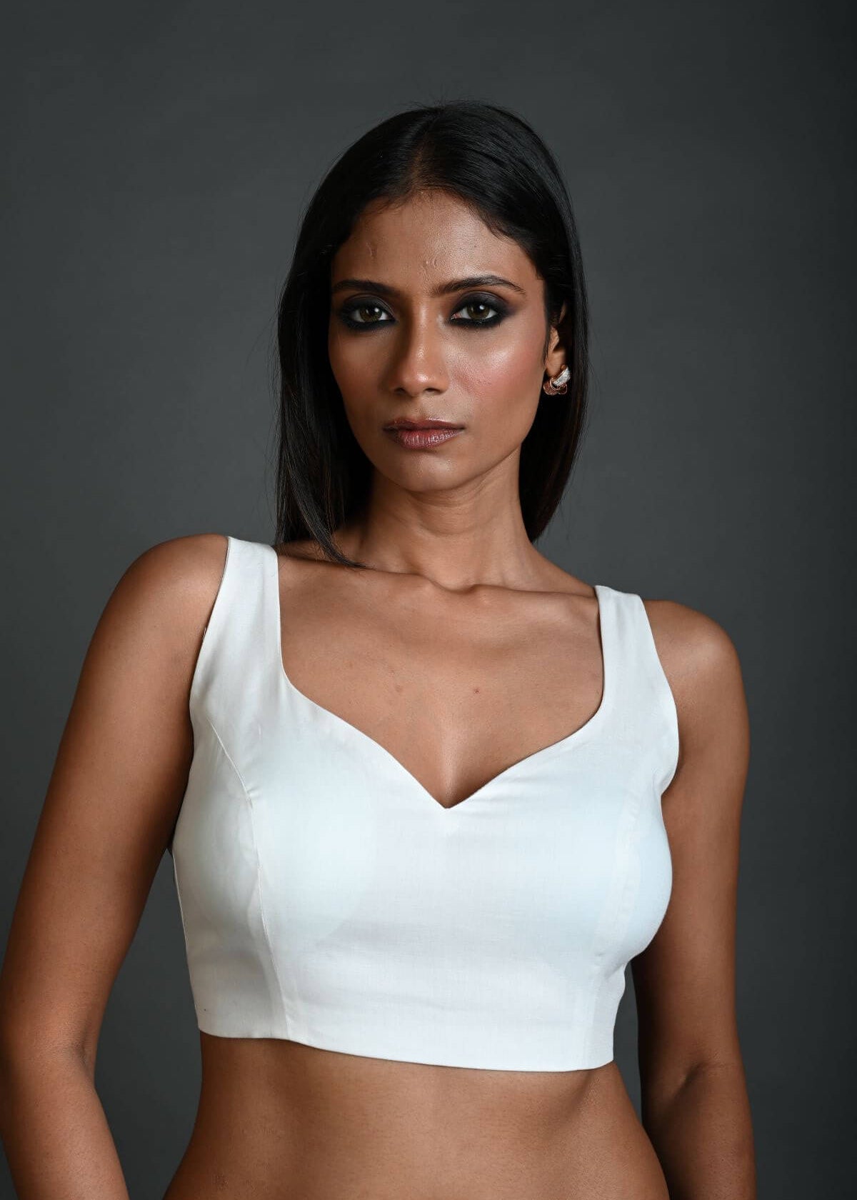 White Sleeveless Blouse in Cotton with Sweetheart Neckline and Back Cutout - Anvi Couture