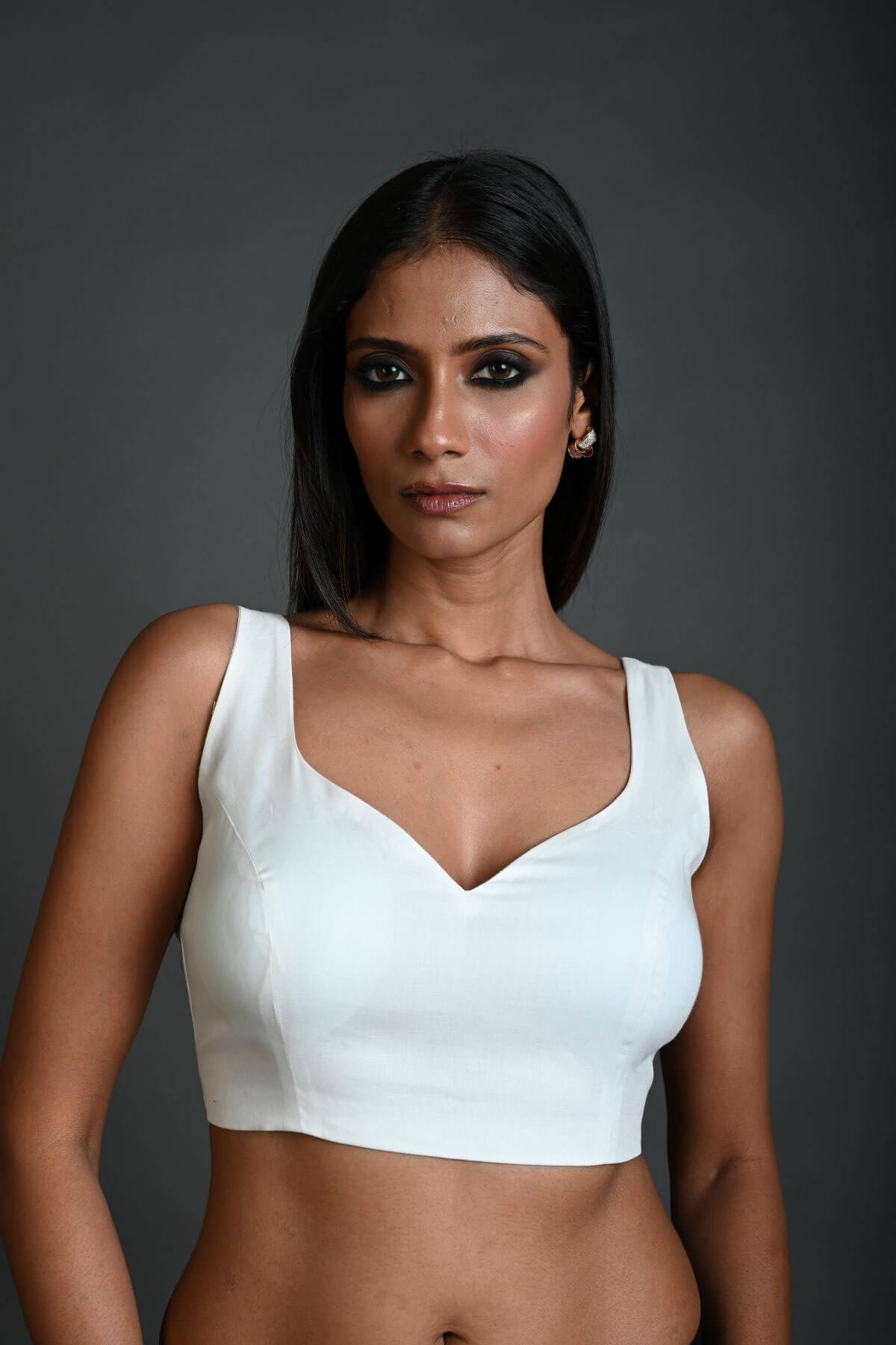 White Sleeveless Blouse in Cotton with Sweetheart Neckline and Back Cutout - Anvi Couture