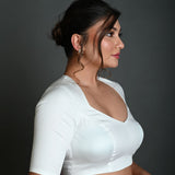 White Half Sleeve Blouse in Cotton with Deep V - Neckline and Back Cutout - Anvi Couture