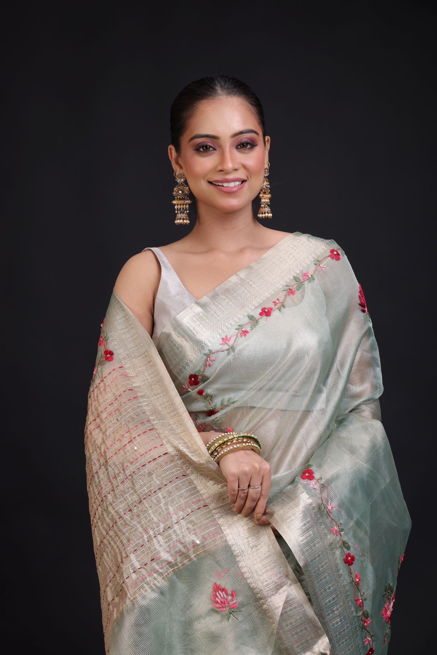 Sage Green Tissue Kota Silk Saree With Floral Thread Embroidery close up