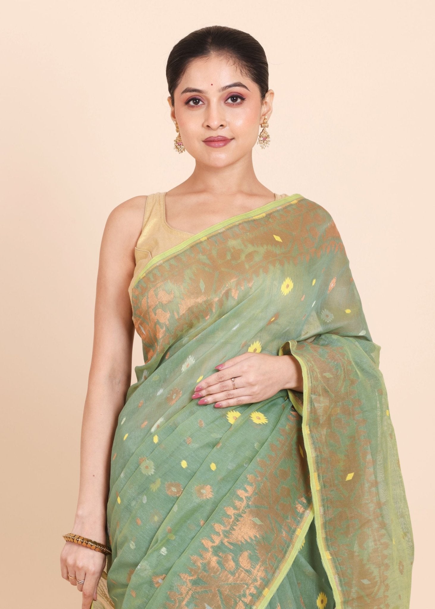 Sea Green Dhakai Jamdani Saree with allover Coper and Gold weaving work - Anvi Couture