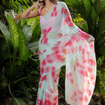 Sea green georgette saree with pink floral prints — pallu drape detail