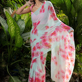 Sea green georgette saree with pink floral prints — pallu drape detail