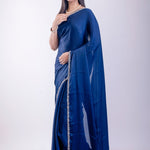 Side profile of blue crepe silk saree showing embroidered border detail — Anvi Couture