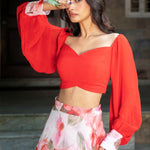 Soft bloom white and orange floral lehenga — close-up of printed floral pattern on lehenga skirt