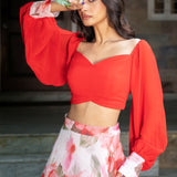 Soft bloom white and orange floral lehenga — close-up of printed floral pattern on lehenga skirt