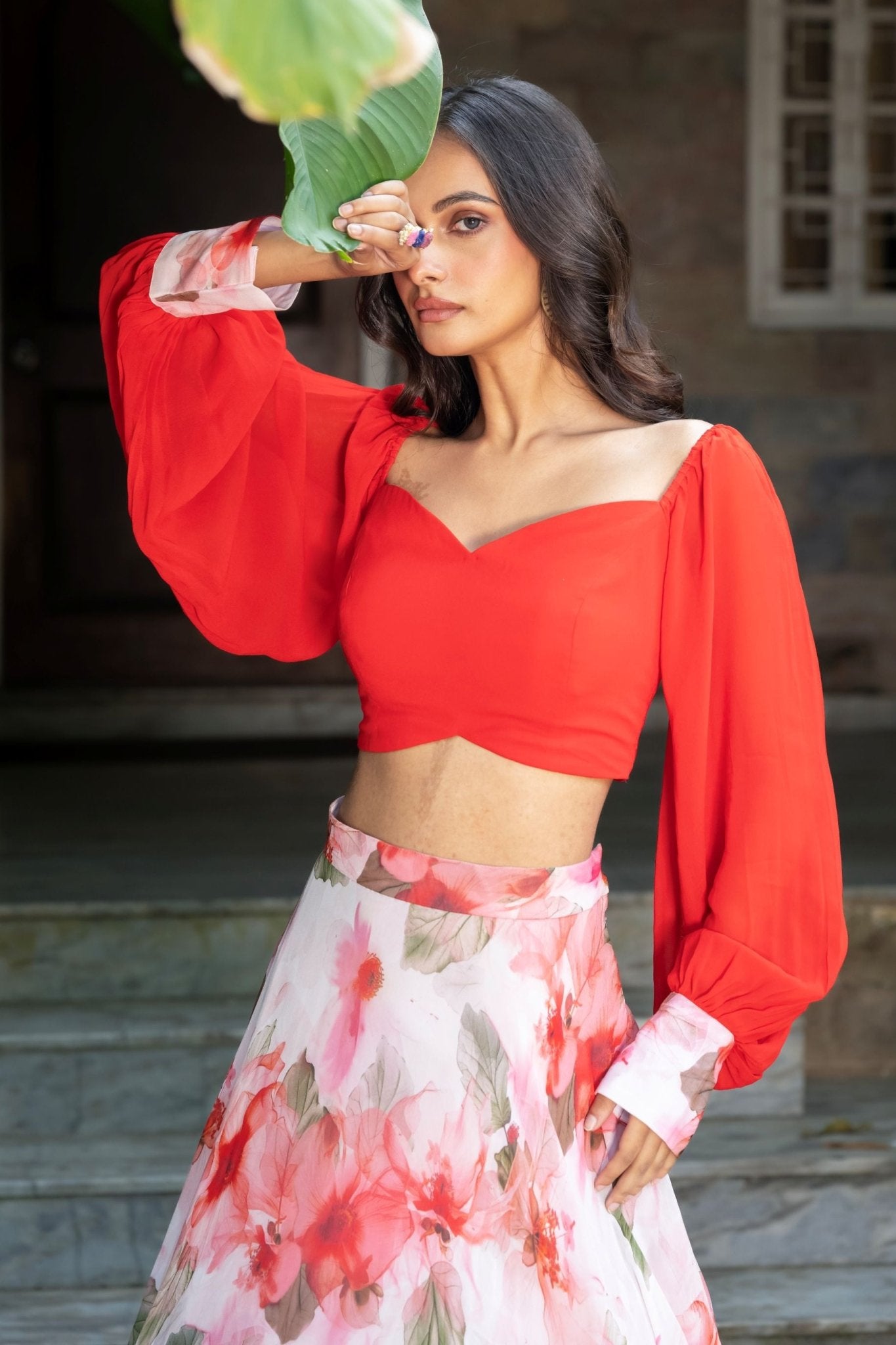 Soft bloom white and orange floral lehenga — close-up of printed floral pattern on lehenga skirt