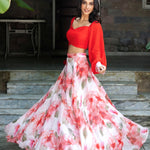 Soft bloom white and orange floral lehenga — side view showing full flared skirt and dupatta styling