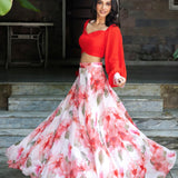 Soft bloom white and orange floral lehenga — side view showing full flared skirt and dupatta styling