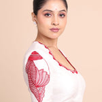 While Raw Silk Blouse With Red Shakha Hand Embroidery work close up