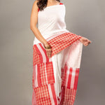 White Cotton Saree With Red Gamcha Patchworks in Border and Pallu - Anvi Couture