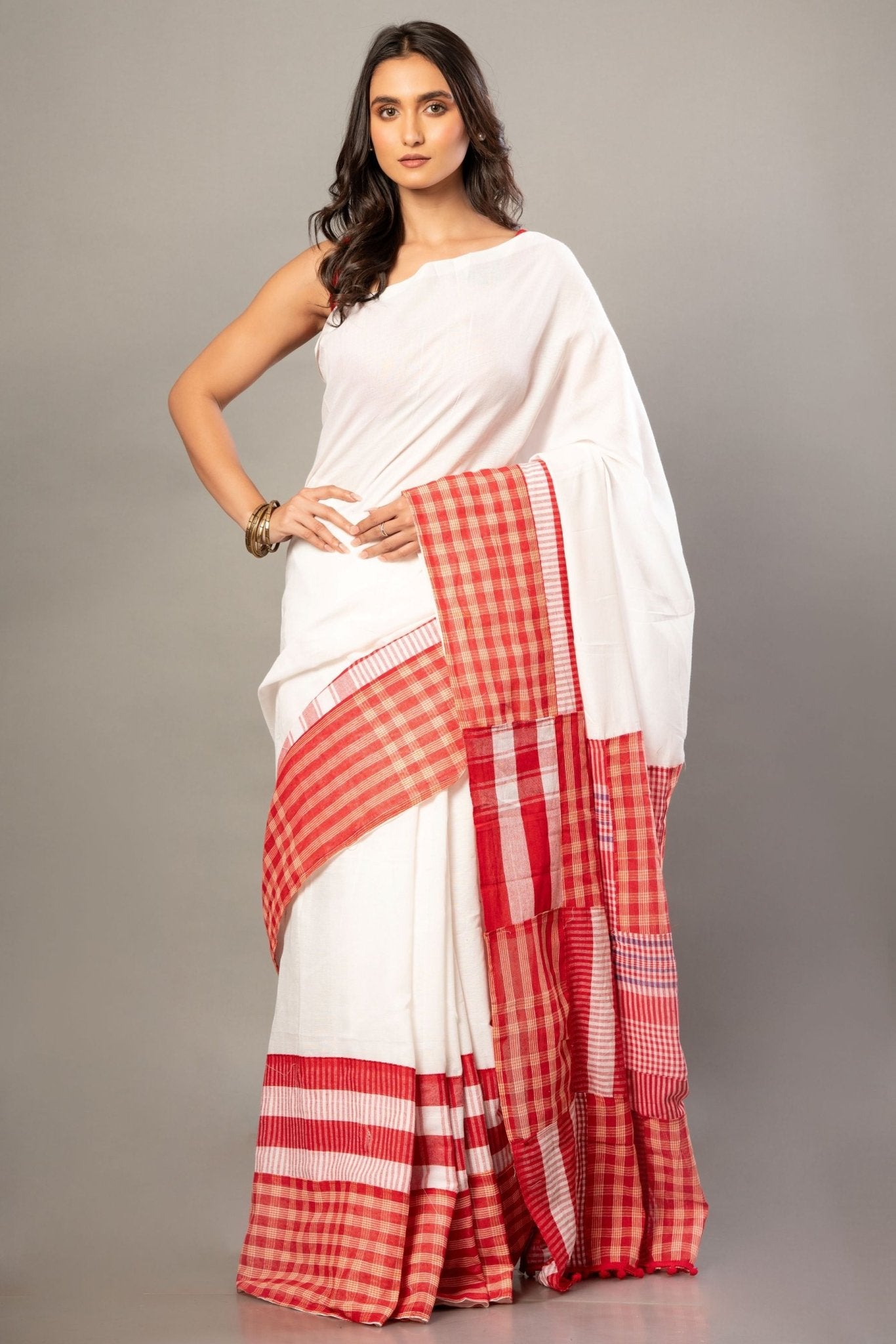 White Cotton Saree With Red Gamcha Patchworks in Border and Pallu - Anvi Couture