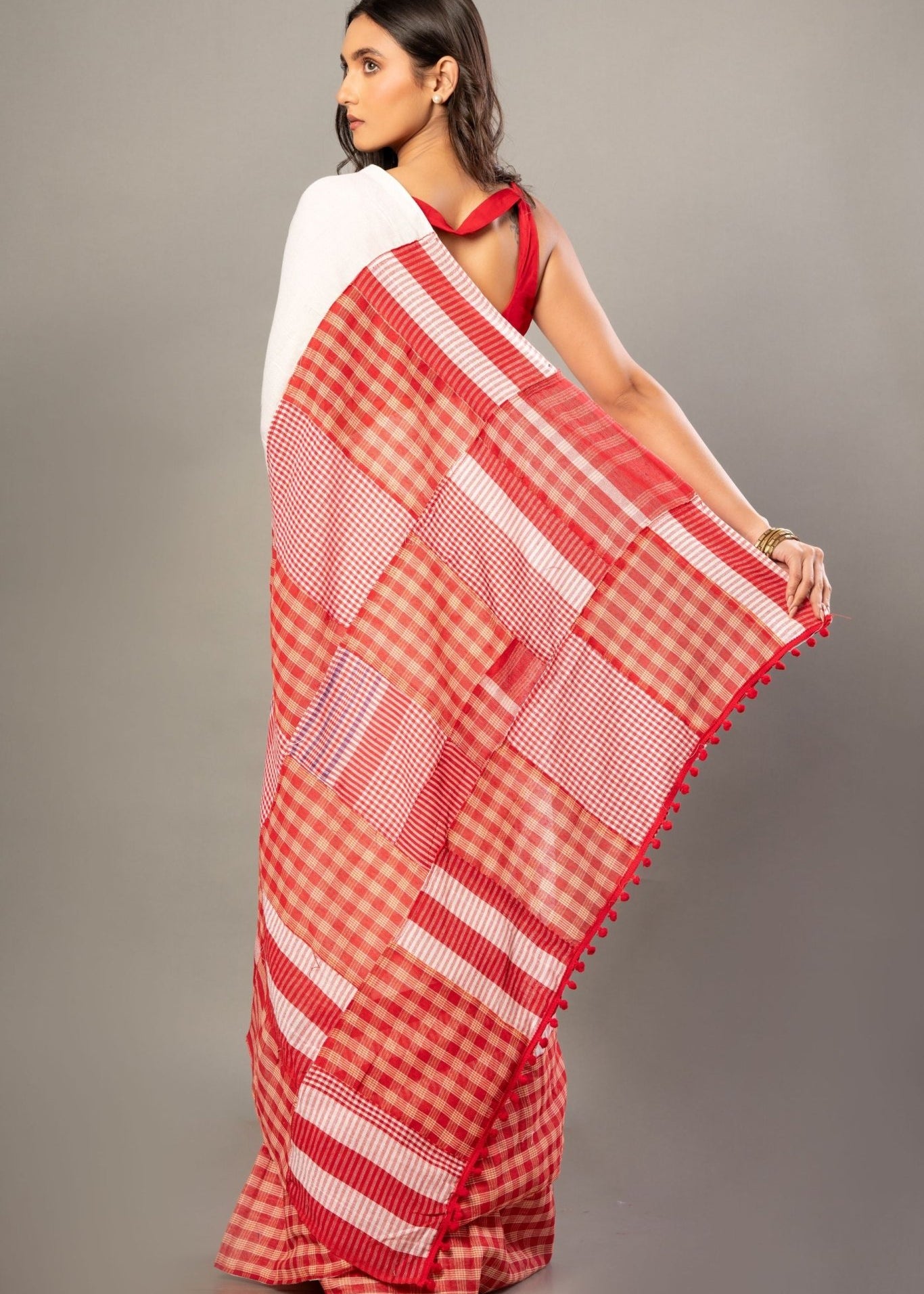 White Cotton Saree With Red Gamcha Patchworks in Border and Pallu - Anvi Couture
