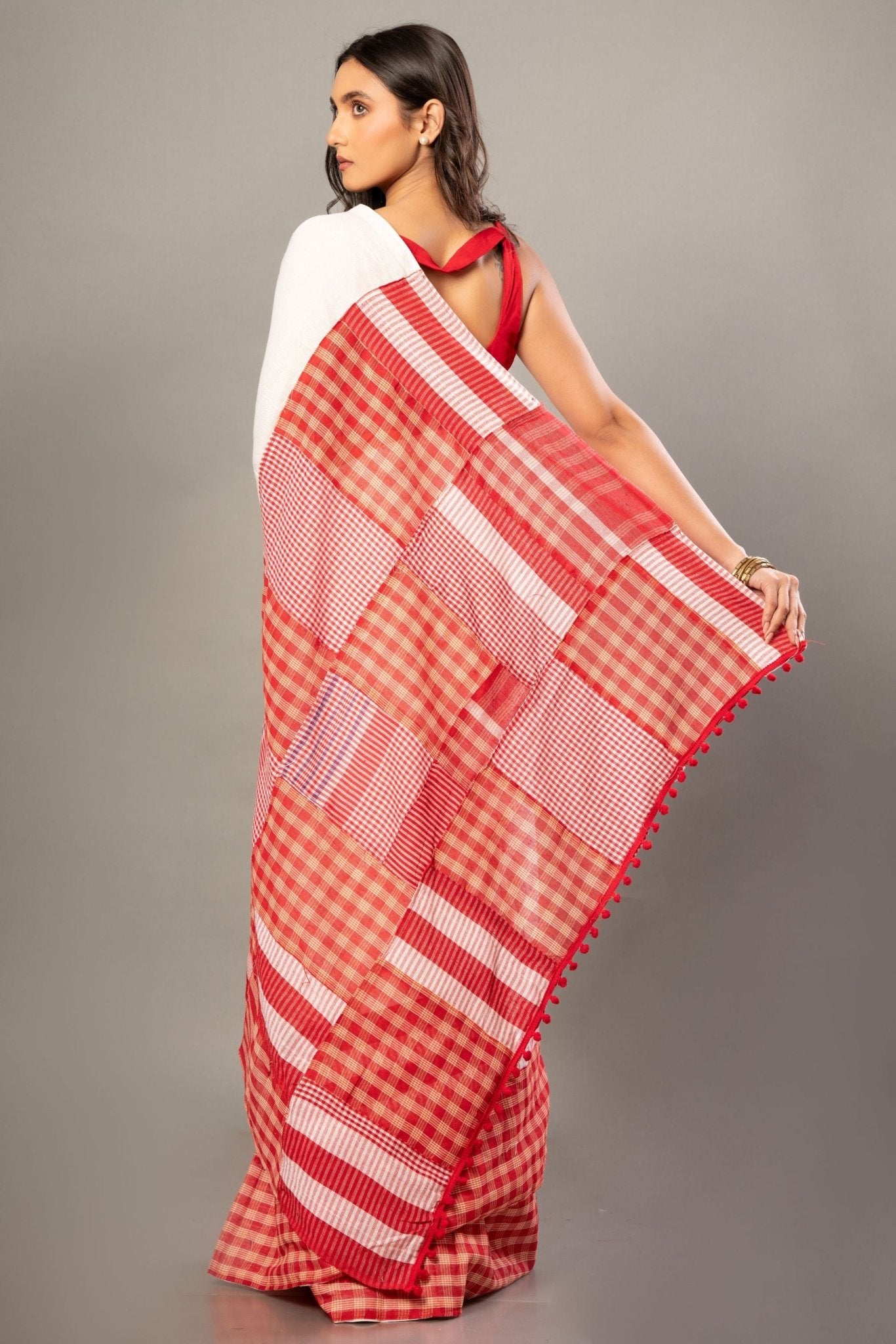 White Cotton Saree With Red Gamcha Patchworks in Border and Pallu - Anvi Couture