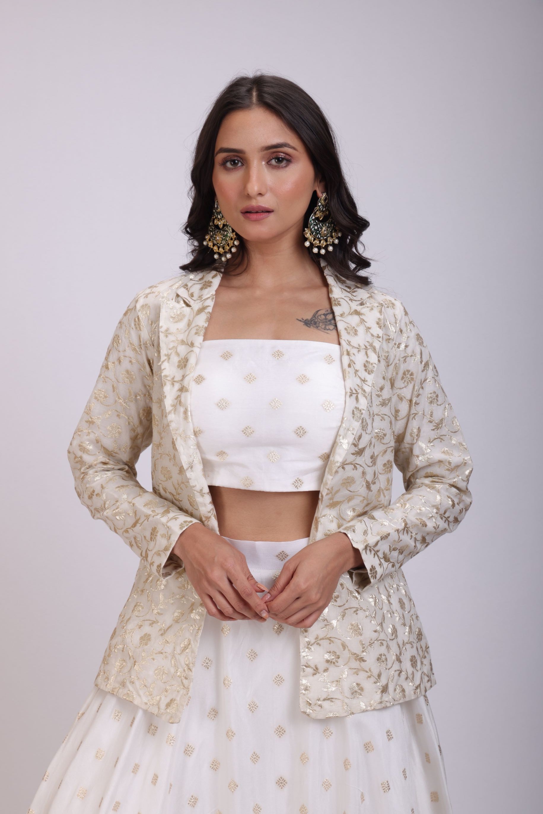 White Embroidered Jacket Lehenga Set close up