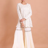 White Georgette Peplum Sharara Set with Gota Patti work - Anvi Couture