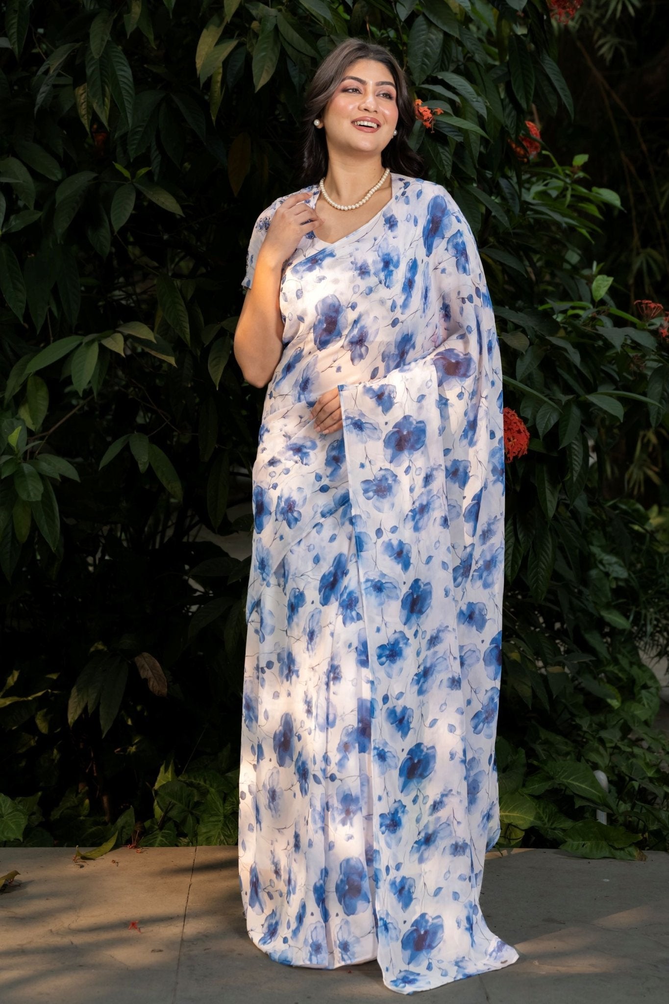 White Georgette Saree with Blue Floral Print - Anvi Couture