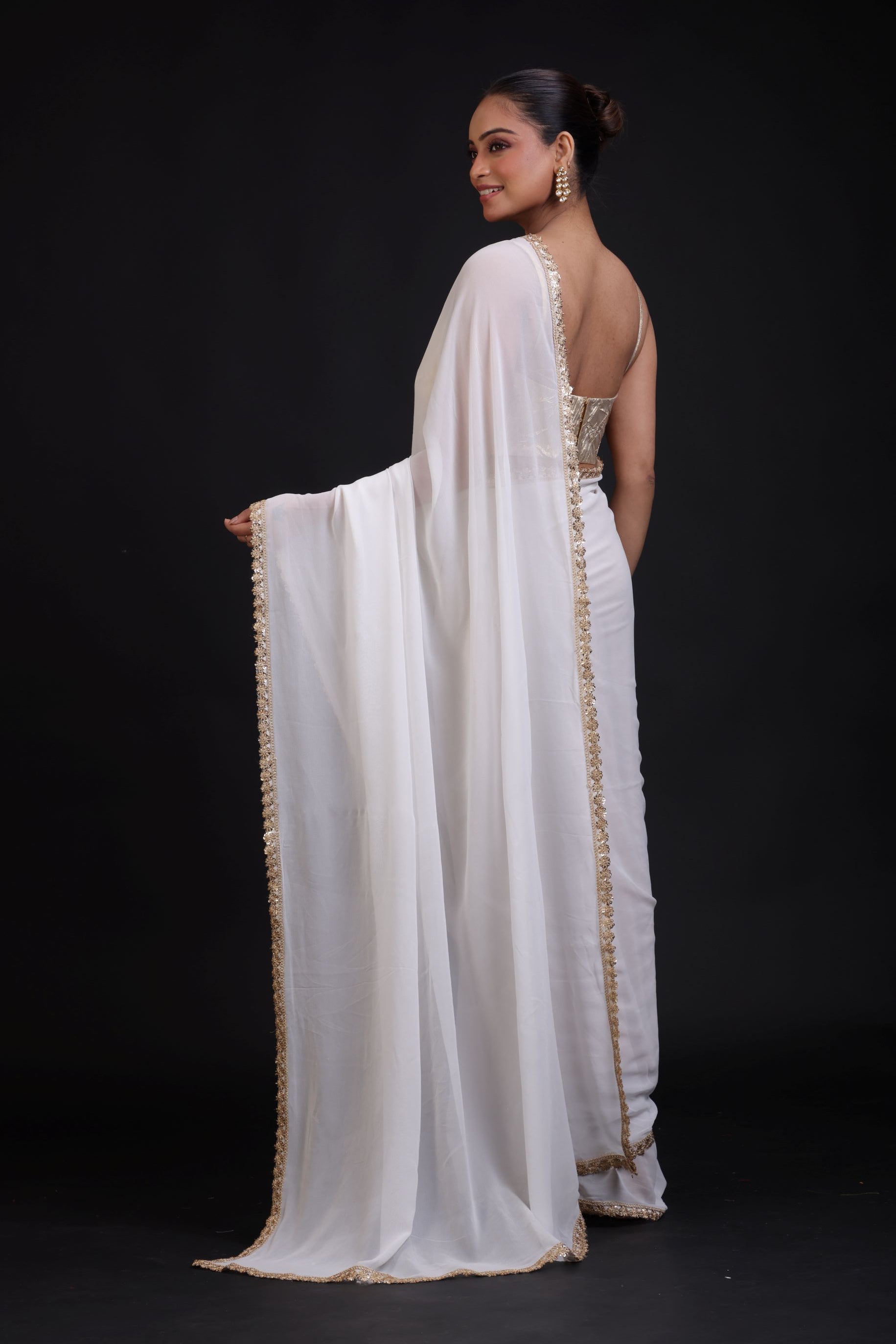 White Georgette Saree with Golden Lace Cutdana Border Back