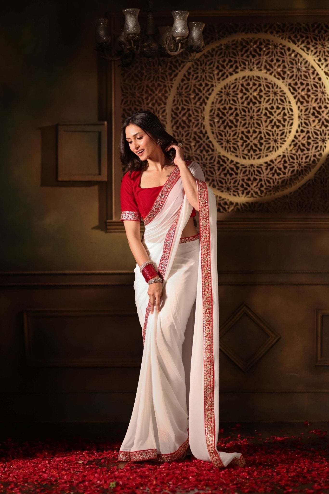 White Georgette saree with Red Embroidered Border - Anvi Couture