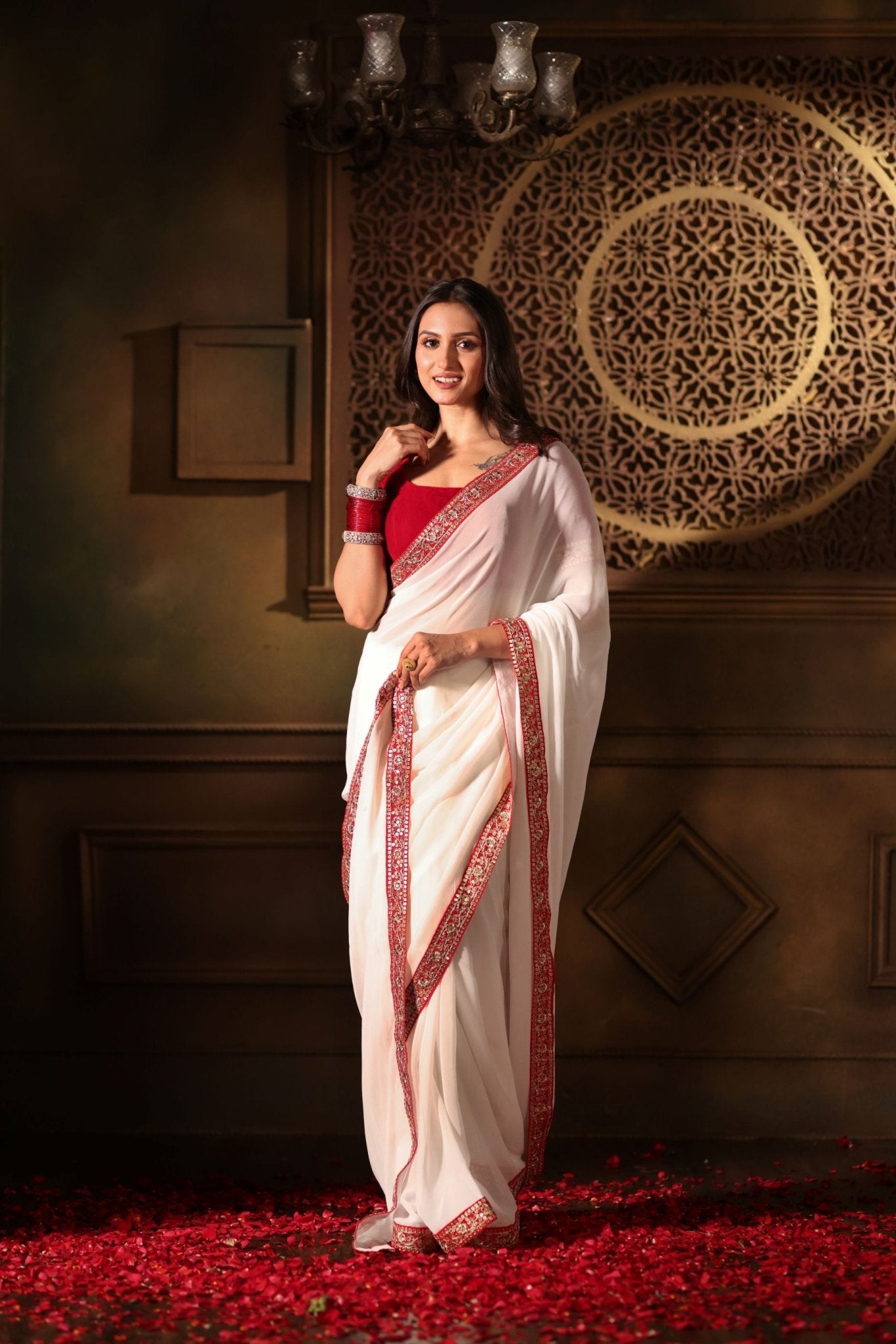 White Georgette saree with Red Embroidered Border - Anvi Couture