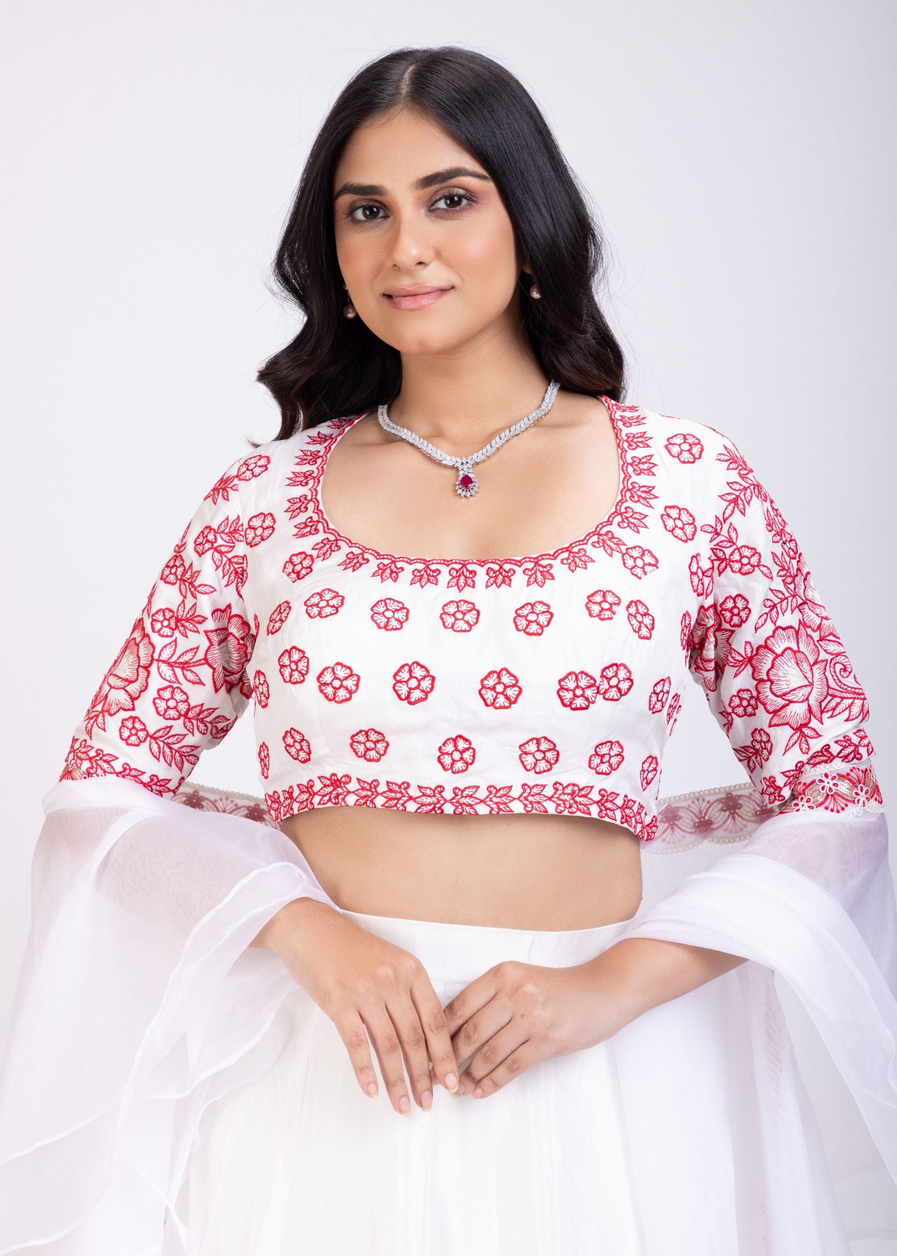 White Lehenga With Red Floral Embroidery and Ruffle Dupatta Close Up