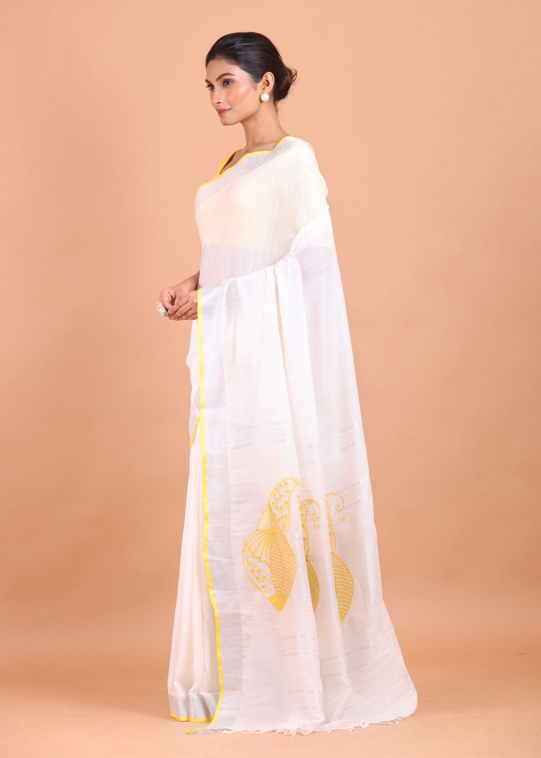 White Linen Saree with Yellow Border and Embroidery Work Side View