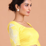 White Linen Saree with Yellow Border and Embroidery Work Blouse design