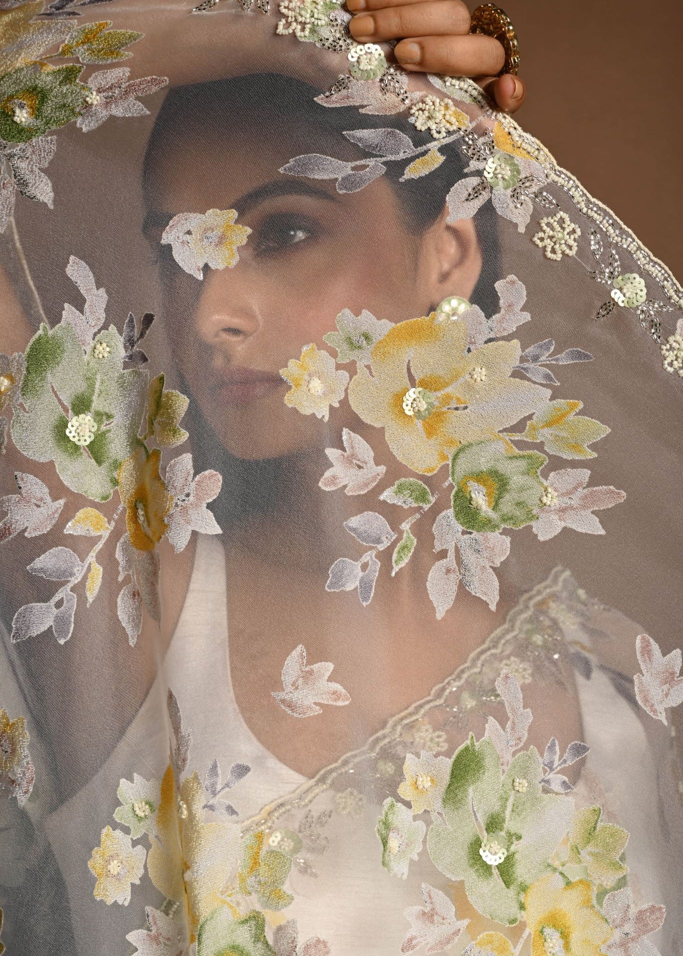 White Net Saree with Multicolored Floral Embroidery and Cutdana Border - Anvi Couture