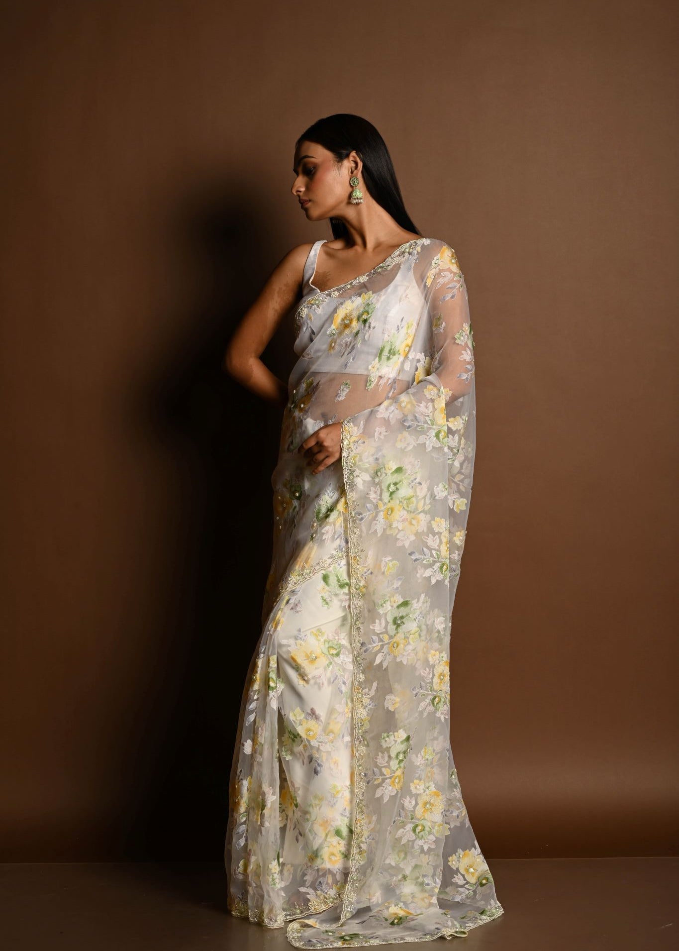 White Net Saree with Multicolored Floral Embroidery and Cutdana Border - Anvi Couture
