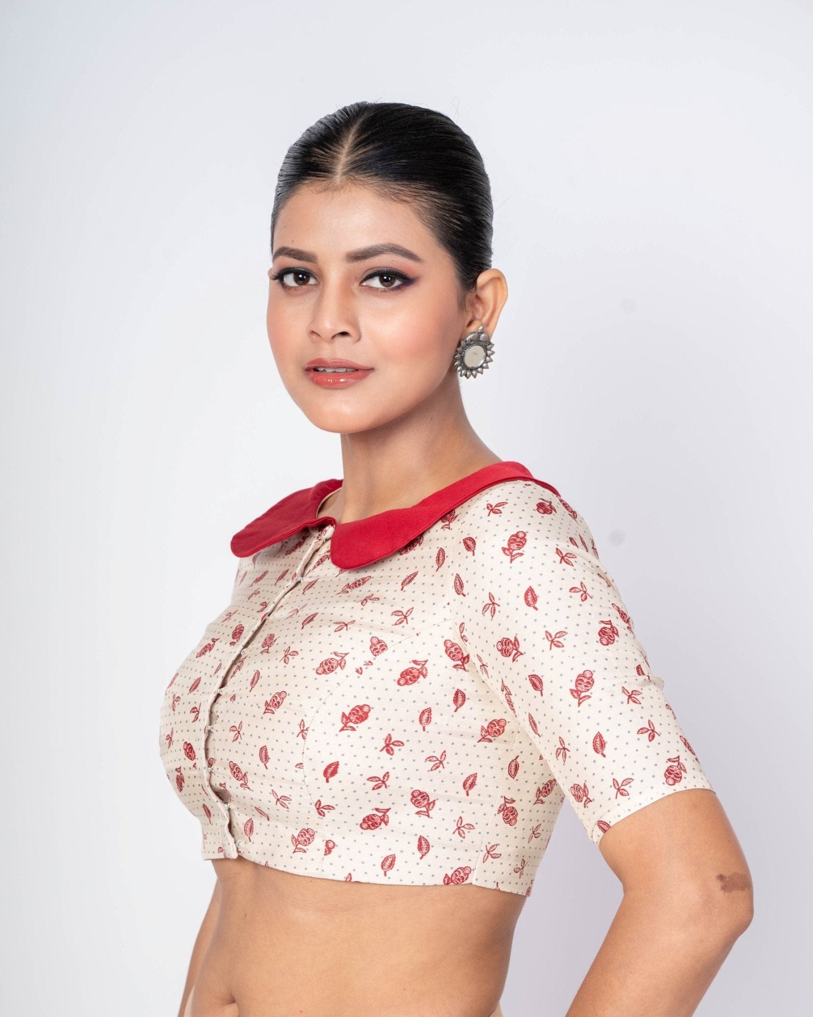 White floral printed collar neck blouse with elbow sleeves for a modern saree look