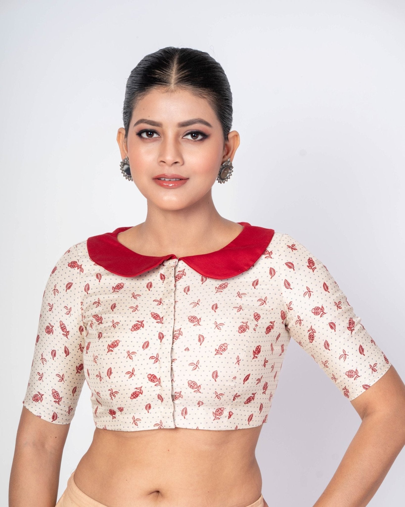White floral printed collar neck blouse with elbow sleeves for a modern saree look