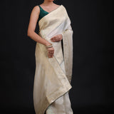 White and Gold Dola Silk Saree With Golden Woven work with Green Piping front
