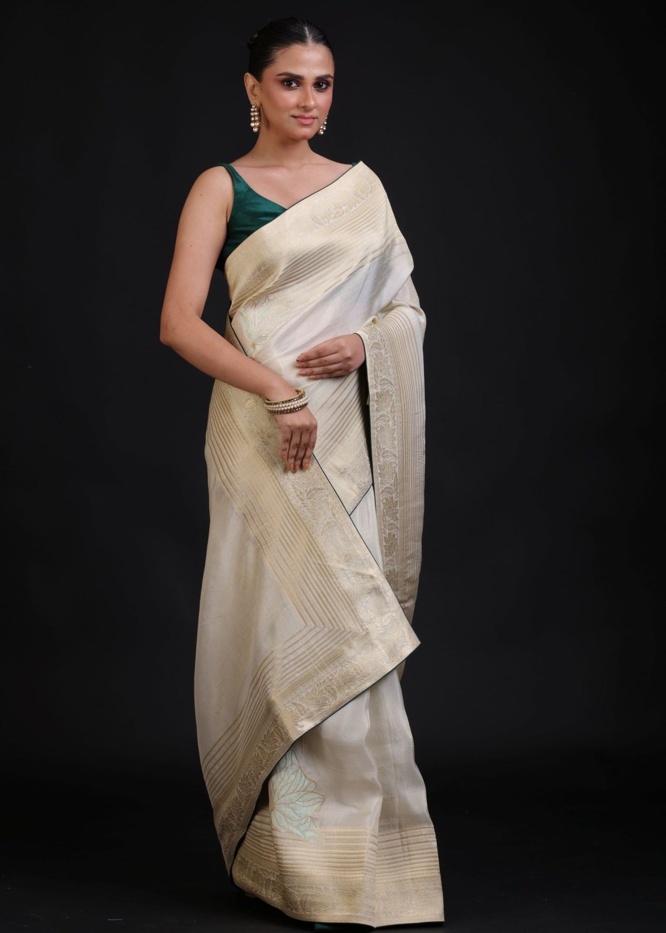 White and Gold Dola Silk Saree With Golden Woven work with Green Piping - Anvi Couture