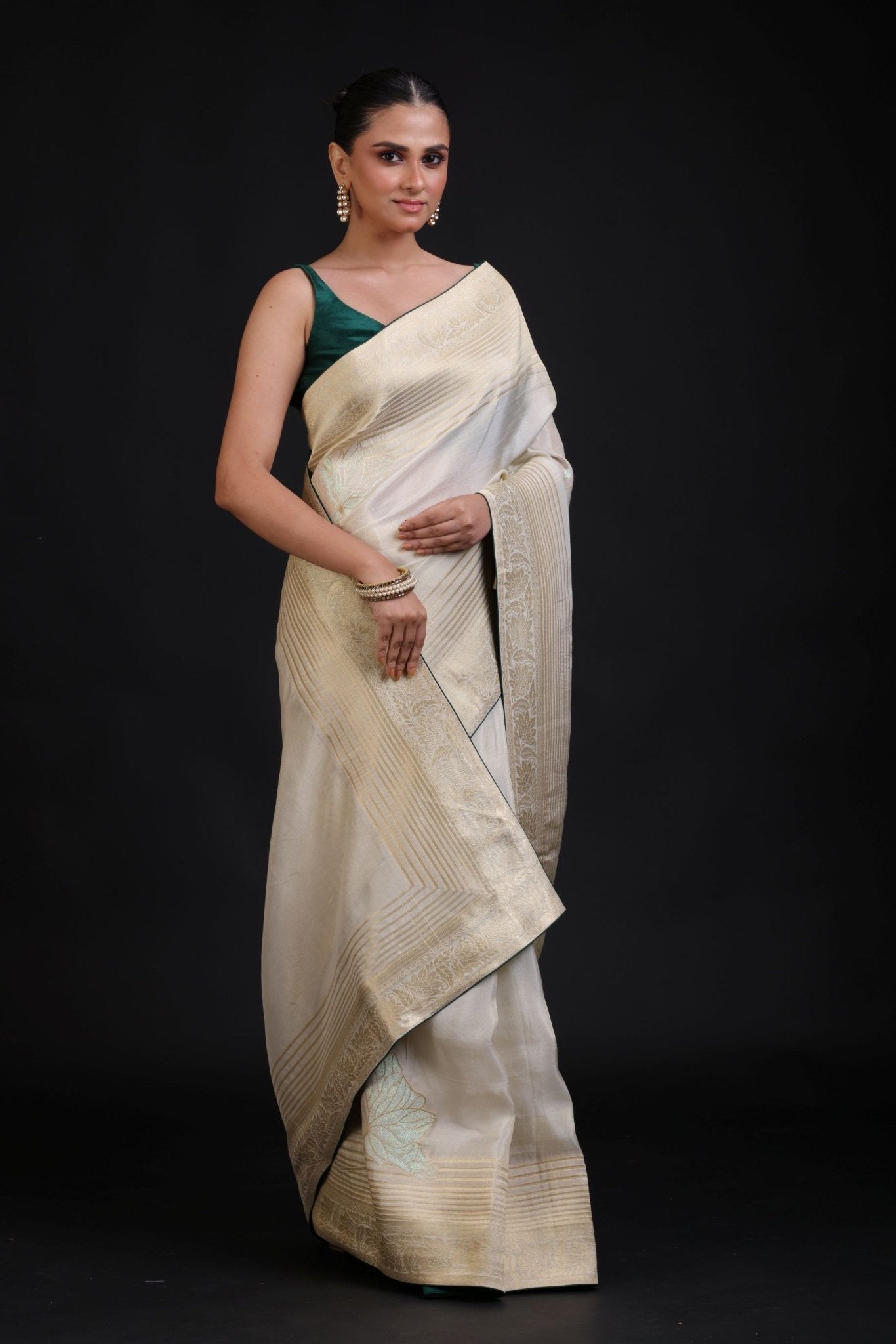 White and Gold Dola Silk Saree With Golden Woven work with Green Piping - Anvi Couture