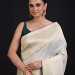 White and Gold Dola Silk Saree With Golden Woven work with Green Piping close up
