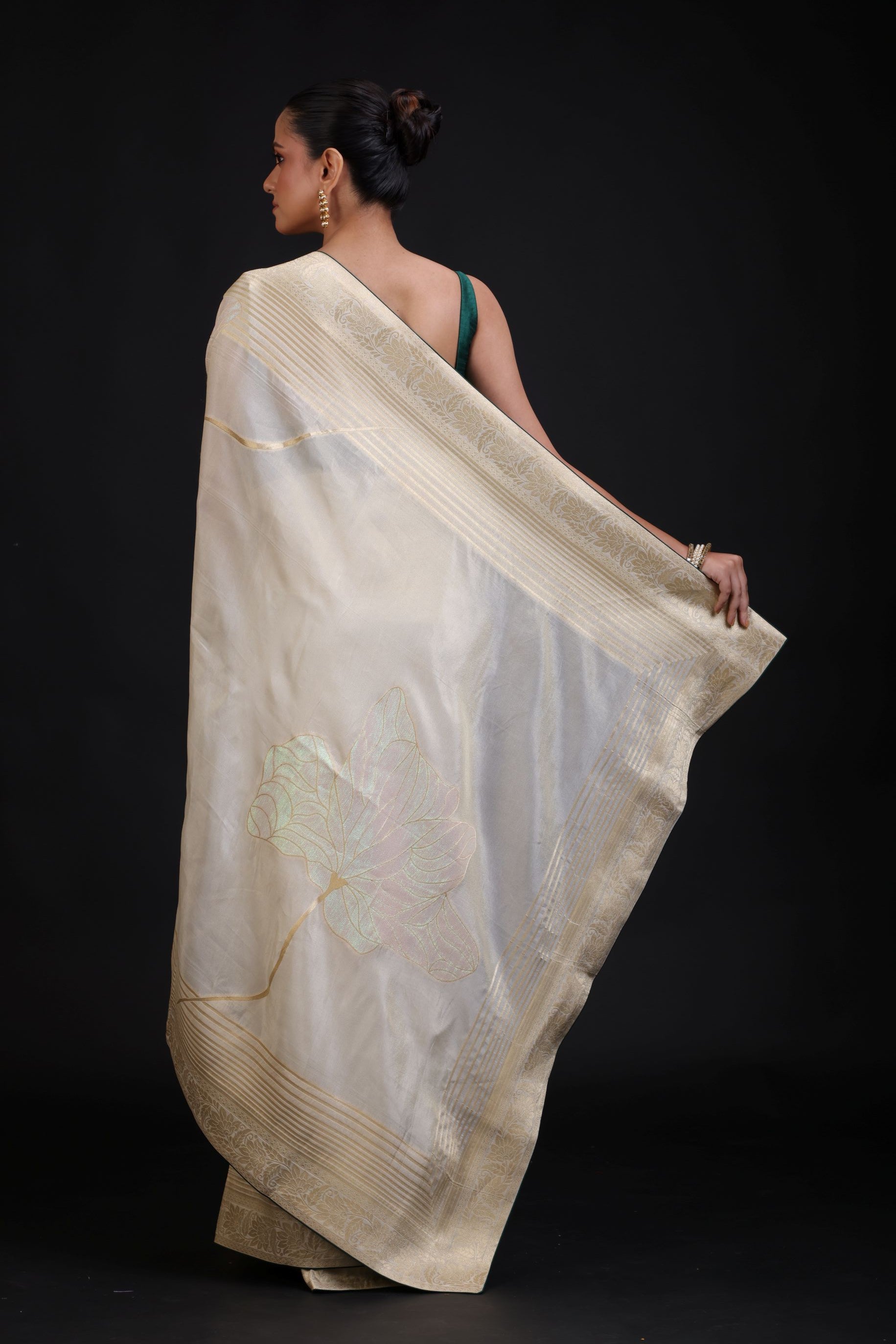 White and Gold Dola Silk Saree With Golden Woven work with Green Piping back