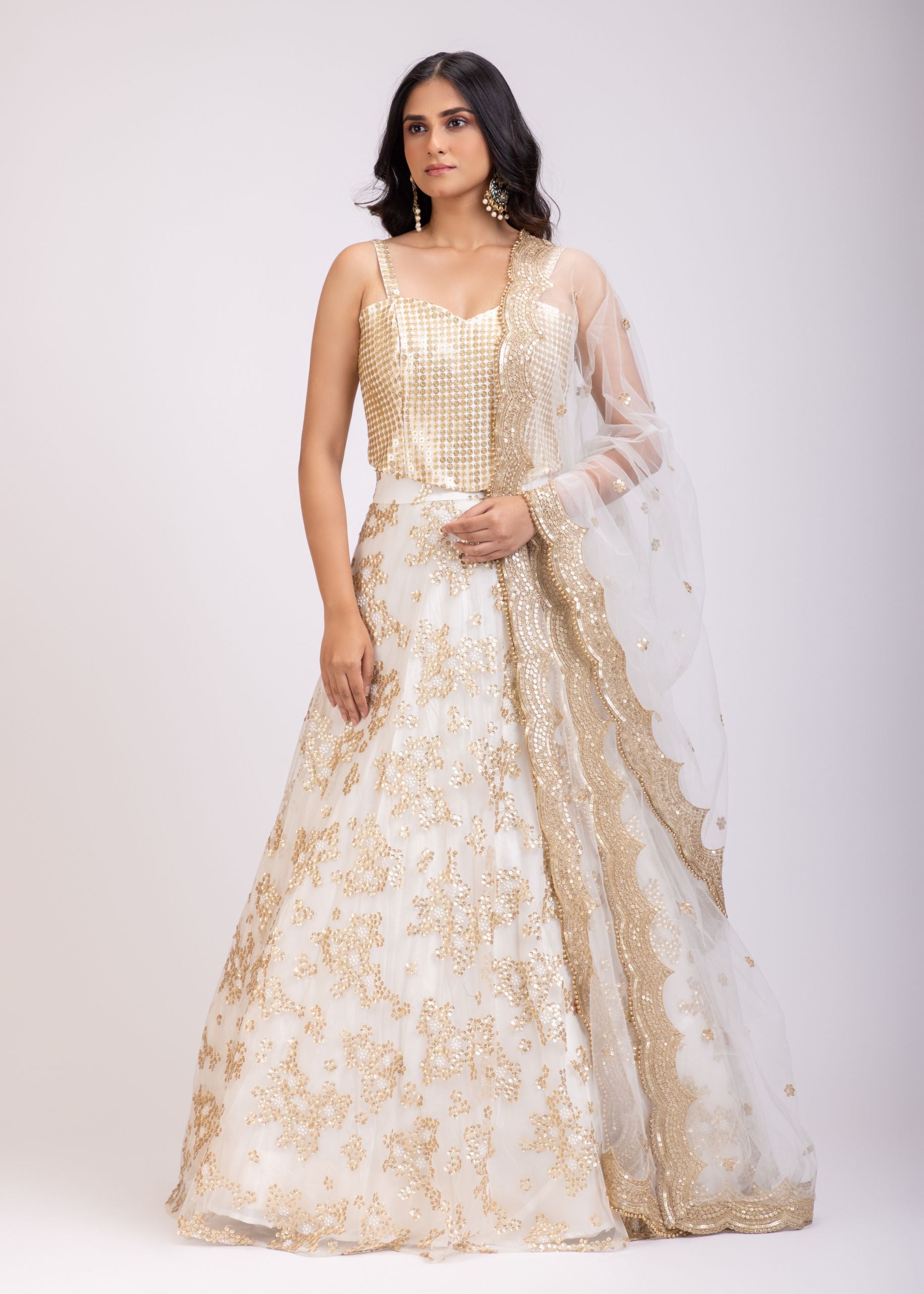 White and Golden Corset Lehenga Set With Sequin Embellished Work front