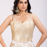 White and Golden Corset Lehenga Set With Sequin Embellished Work close up