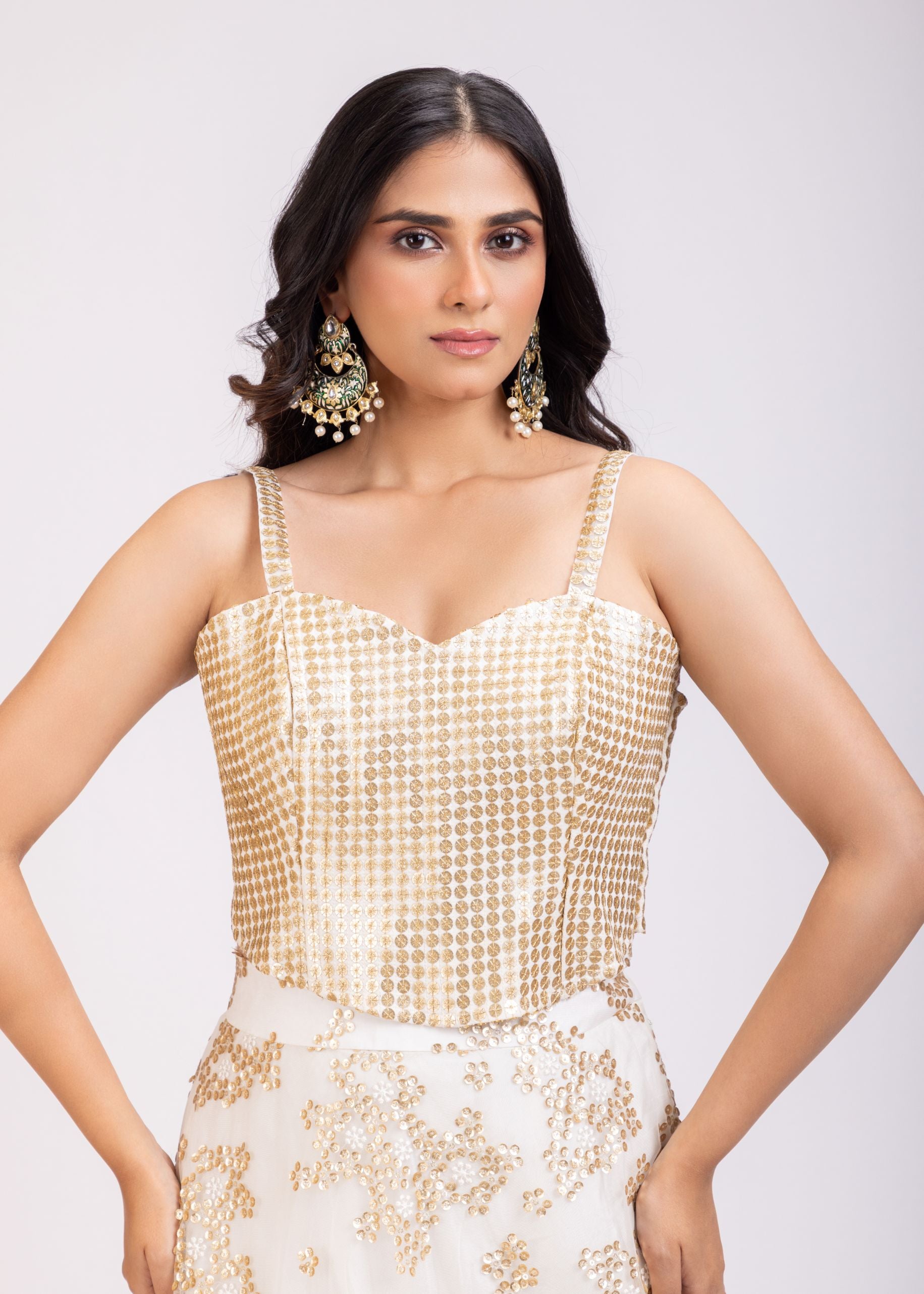 White and Golden Corset Lehenga Set With Sequin Embellished Work close up