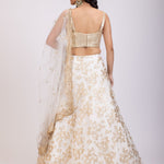 White and Golden Corset Lehenga Set With Sequin Embellished Work back