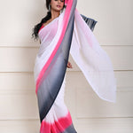 Close-up of pleated drape on white ombre pure georgette saree