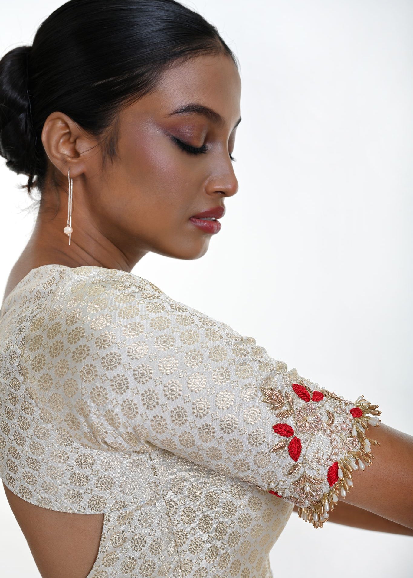 White brocade blouse — side profile showing Queen Anne neckline shape