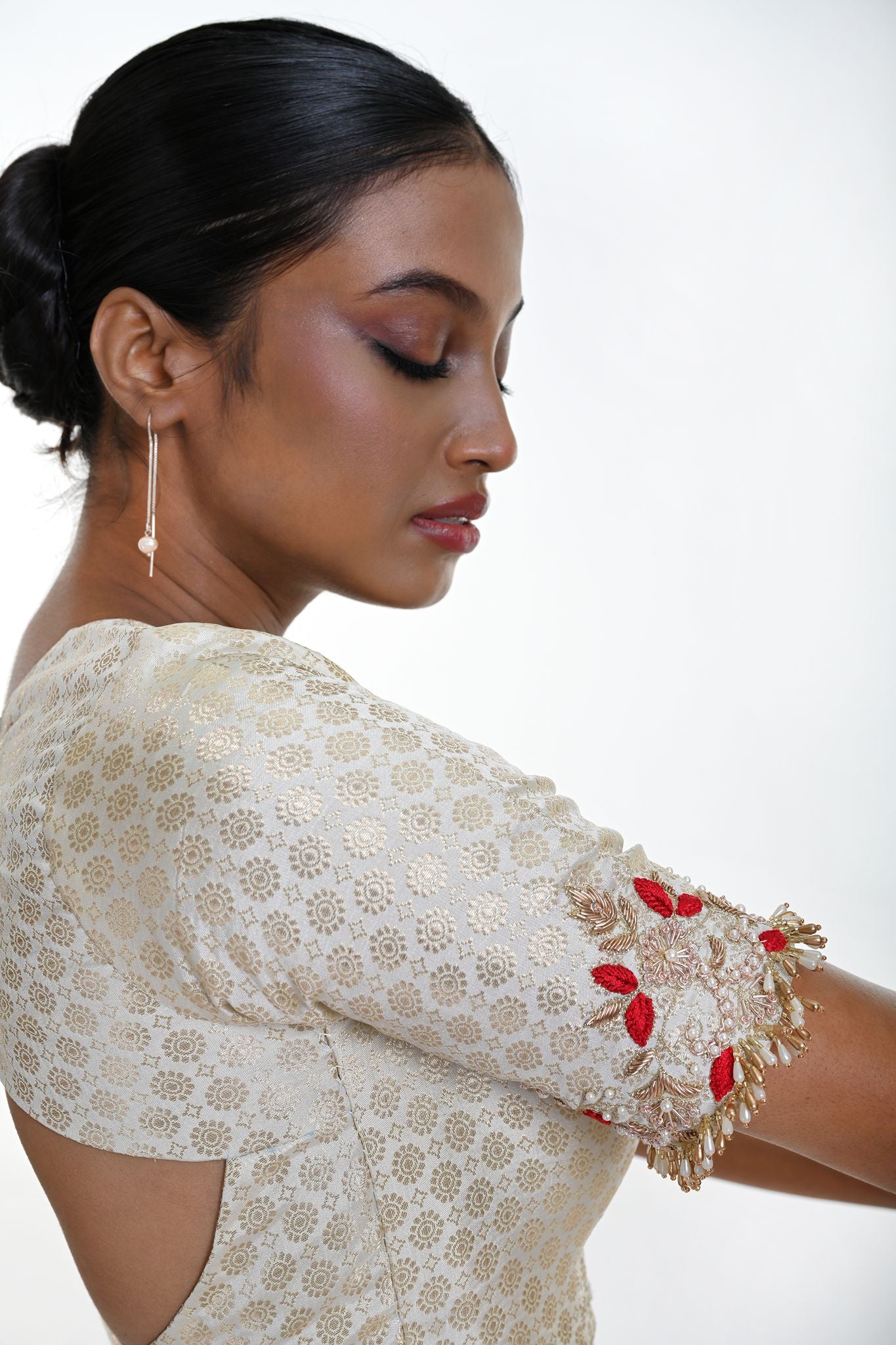 White brocade blouse — side profile showing Queen Anne neckline shape