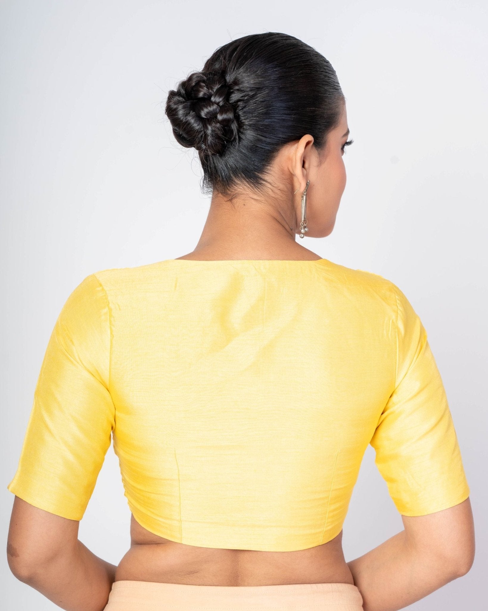 Back view of Butter Yellow Half Sleeves U - Neck Premium Satin Silk Blouse with Back Closure 