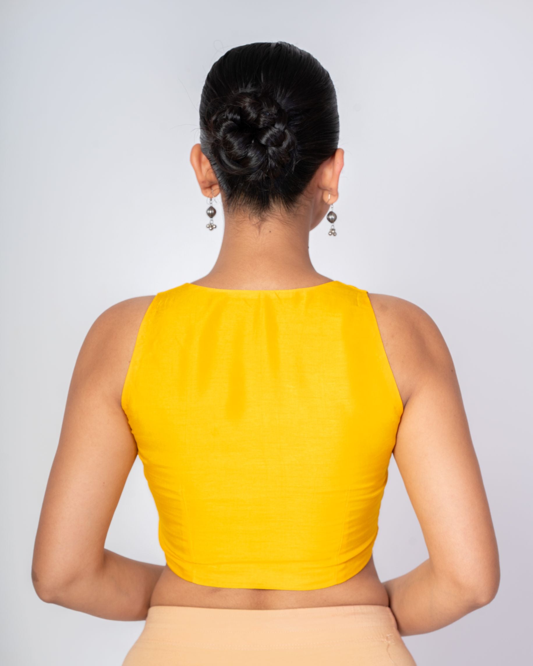 Yellow Queen Anne Sleeveless Raw Silk Blouse with Front Closure. - Anvi Couture