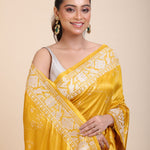 Yellow Silk Saree With White Floral Embroidered Border close up